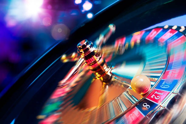 Microgaming table game interface showing dealer, cards, and betting layout